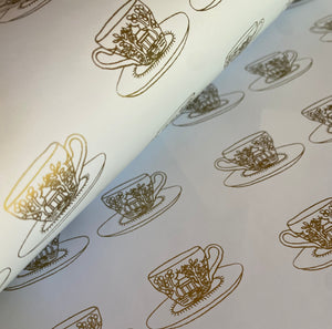 Tea cup wrapping paper in gold