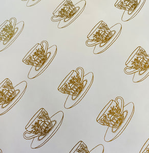 Tea cup wrapping paper in gold