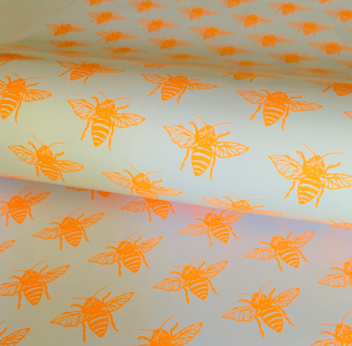 Bee wrapping paper in neon orange